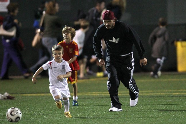 David Beckham, black addidas track suit, black sweatshirt, Romeo and Cruz